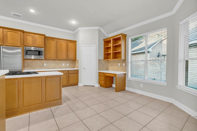 kitchen with decorative backsplash, ornamental molding, stainless steel appliances, and a wealth of natural light