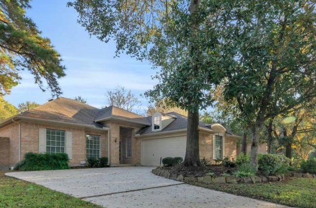 ranch-style home featuring a garage