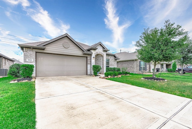 ranch-style house with cooling unit, a garage, and a front lawn