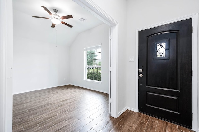 foyer featuring hardwood / wood-style flooring, ceiling fan, and lofted ceiling