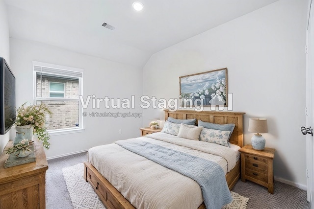 bedroom with light colored carpet and vaulted ceiling