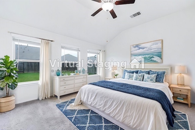 carpeted bedroom featuring ceiling fan and lofted ceiling