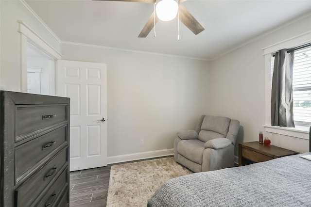 bedroom featuring ceiling fan and ornamental molding