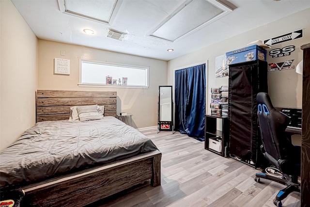 bedroom featuring light hardwood / wood-style flooring