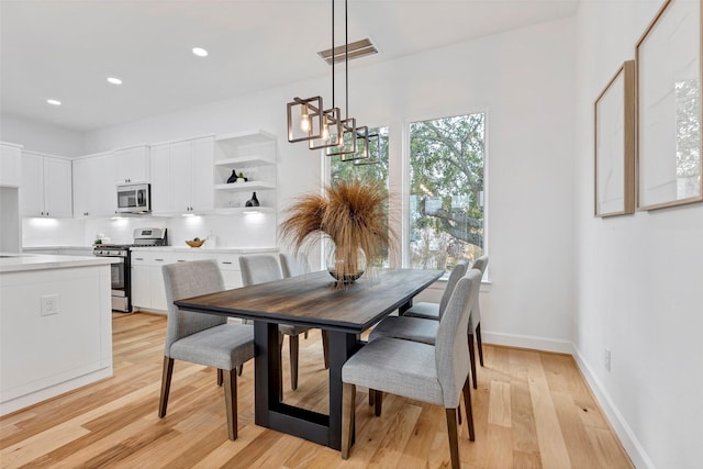 dining area featuring light hardwood / wood-style flooring