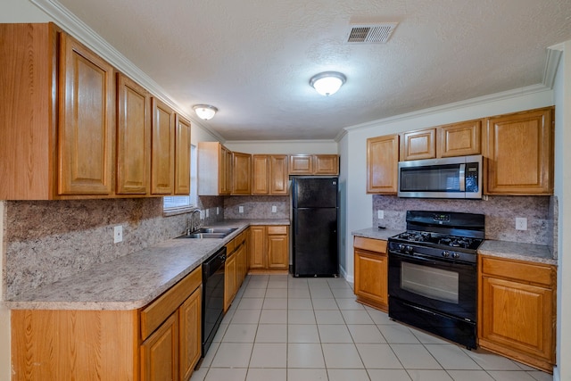 kitchen featuring a textured ceiling, sink, crown molding, and black appliances