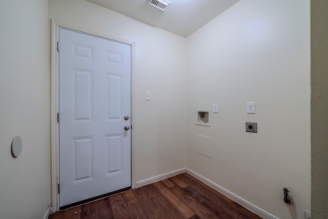 clothes washing area with hookup for an electric dryer, hookup for a washing machine, and dark wood-type flooring