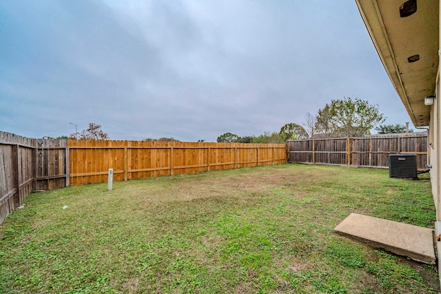 view of yard featuring central AC