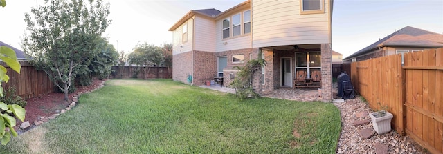 view of yard featuring ceiling fan