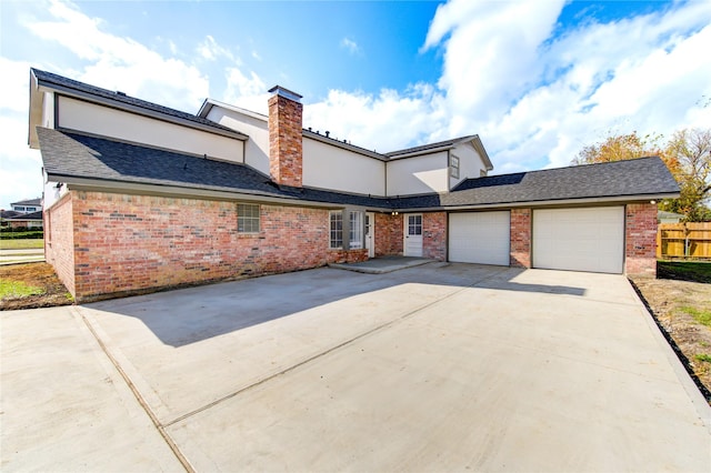 view of property featuring a garage