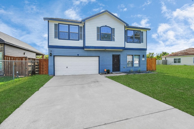 view of front facade with a front yard and a garage