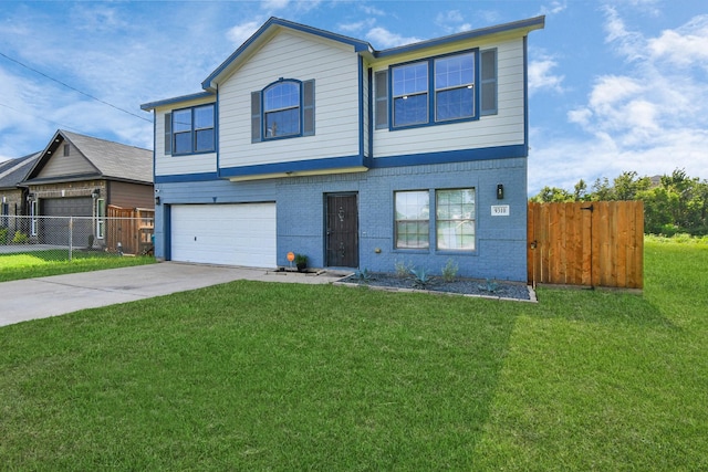 view of front of home featuring a garage and a front lawn