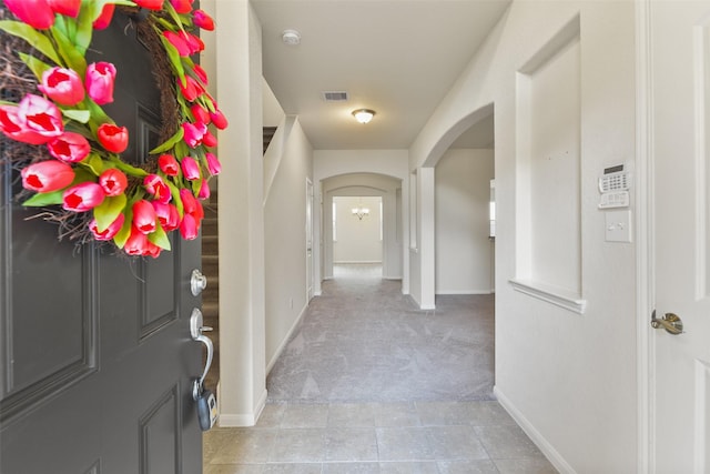 interior space featuring light colored carpet