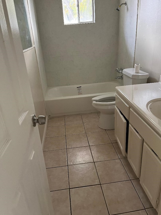 full bathroom with toilet, vanity, tile patterned floors, and tub / shower combination