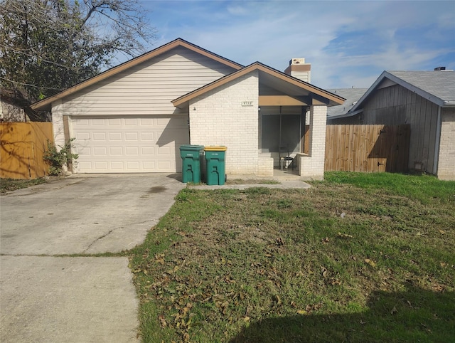 view of home's exterior featuring a garage and a lawn