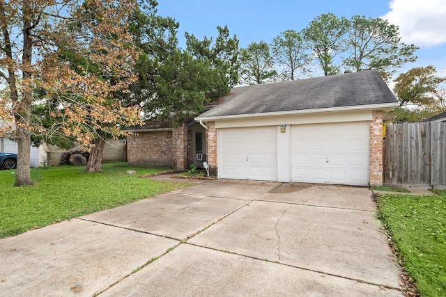 garage featuring a yard