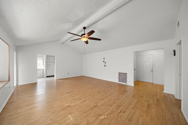 unfurnished living room featuring light wood-type flooring, a textured ceiling, lofted ceiling with beams, and ceiling fan