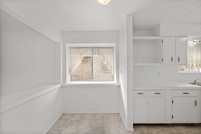 interior space with a textured ceiling