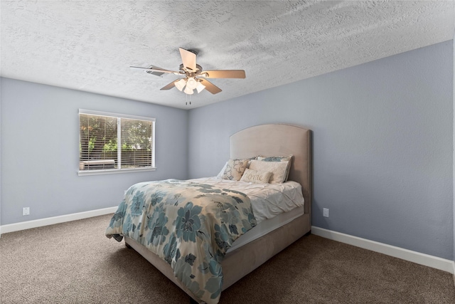 bedroom featuring carpet flooring, ceiling fan, and a textured ceiling