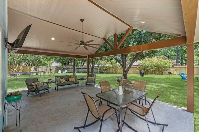 view of patio / terrace featuring outdoor lounge area, ceiling fan, and a trampoline