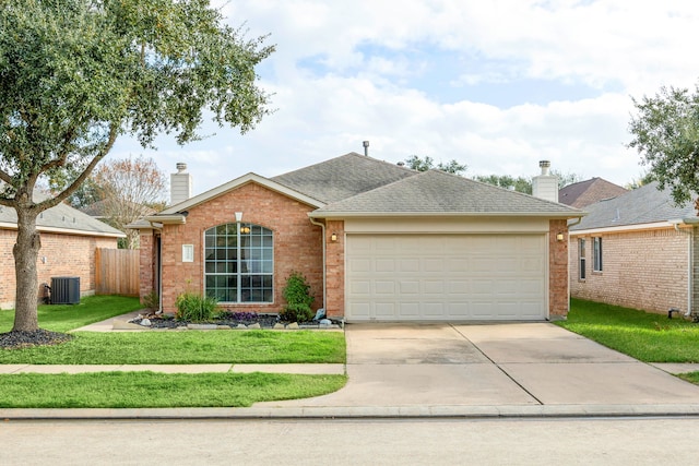 single story home featuring a garage, central air condition unit, and a front yard