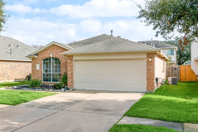 ranch-style house with a garage, a front lawn, and cooling unit