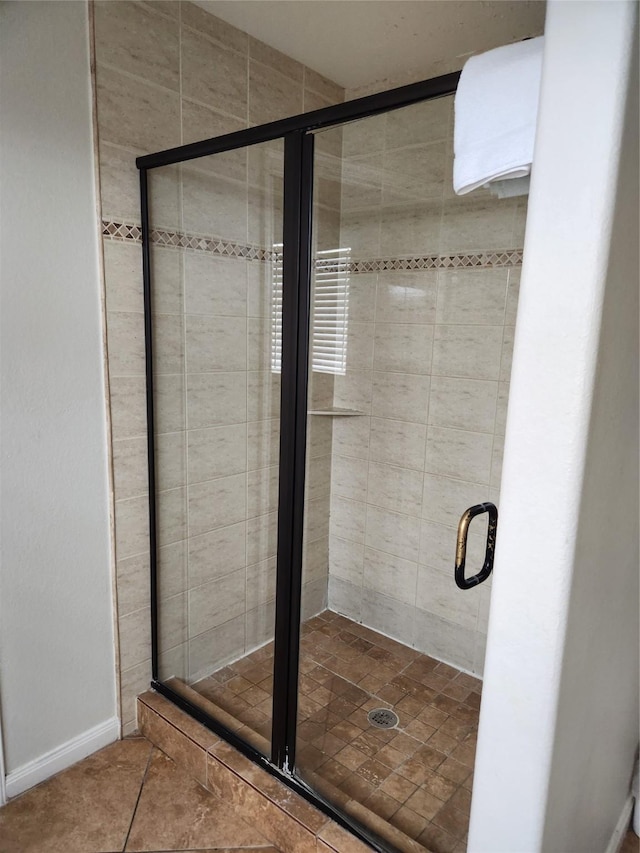 22901 Buena St, Galveston, TX 77554 - bathroom with tile patterned flooring and walk in shower