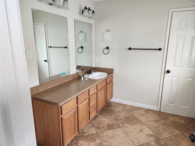 22901 Buena St, Galveston, TX 77554 - bathroom with tile patterned flooring and vanity