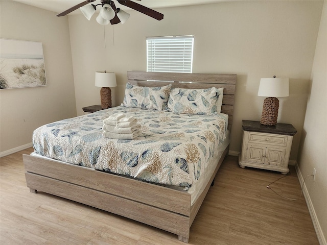 22901 Buena St, Galveston, TX 77554 - bedroom featuring ceiling fan and light wood-type flooring