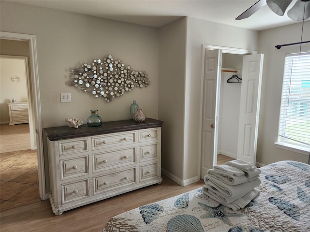 22901 Buena St, Galveston, TX 77554 - bedroom with light hardwood / wood-style floors and ceiling fan