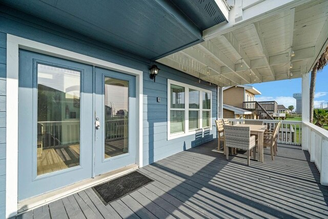 22901 Buena St, Galveston, TX 77554 - wooden deck featuring french doors