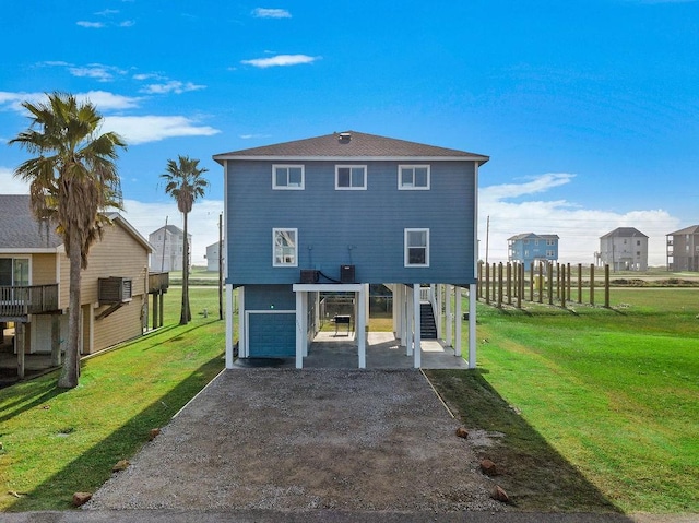 22901 Buena St, Galveston, TX 77554 - back of house with a yard