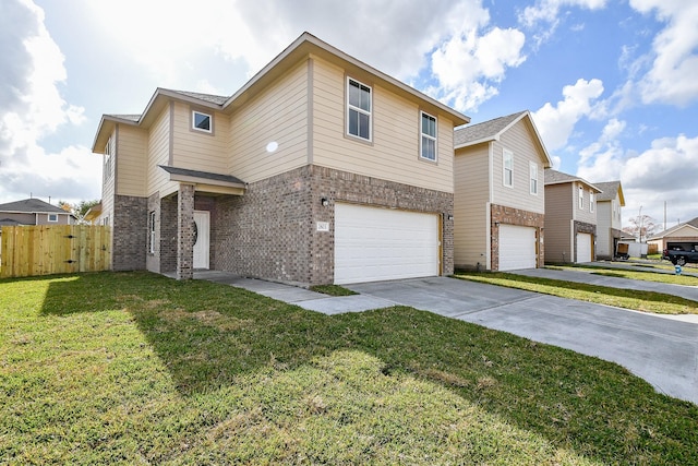 view of front facade with a garage and a front lawn