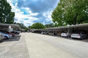 view of parking featuring a carport