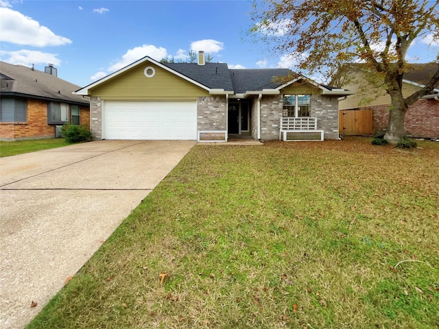 single story home featuring a front lawn and a garage