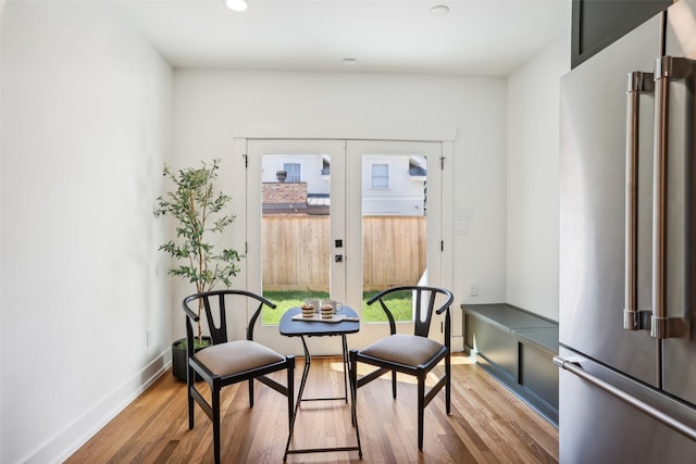 sitting room with hardwood / wood-style floors