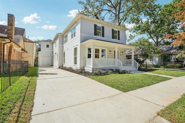 view of front of house with covered porch, an outdoor structure, and a front lawn