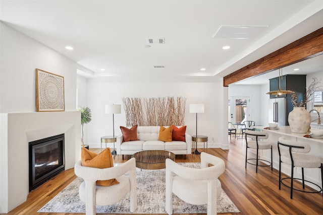 living room featuring hardwood / wood-style flooring