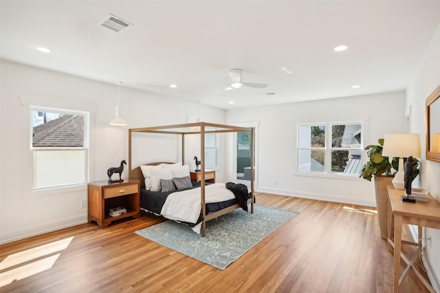 bedroom featuring ceiling fan and light wood-type flooring