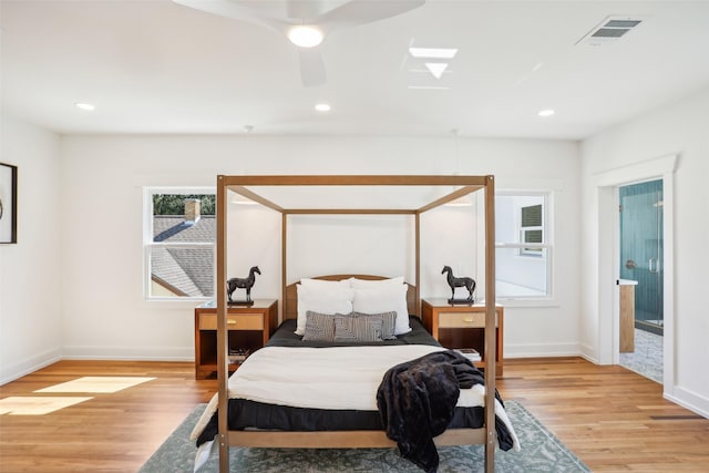 bedroom featuring ceiling fan and light hardwood / wood-style floors