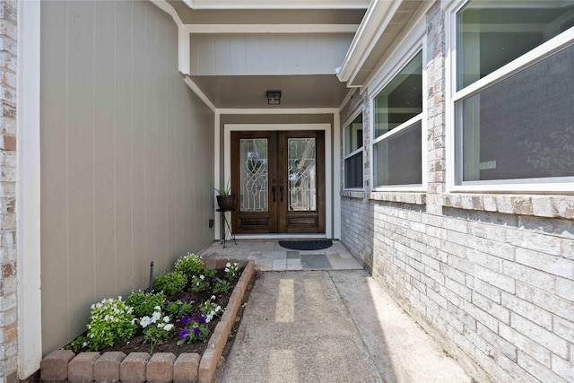 property entrance featuring french doors