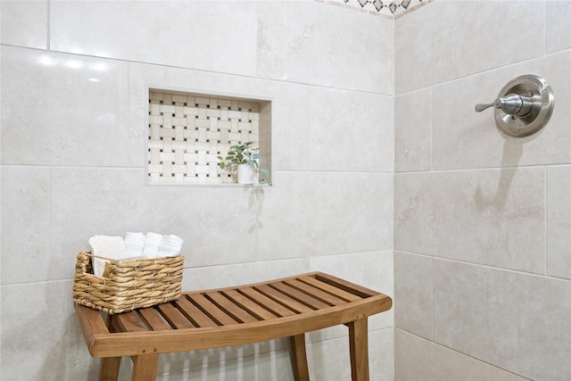 interior space with tiled shower