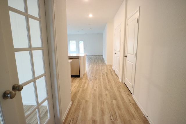 hallway featuring light wood-type flooring