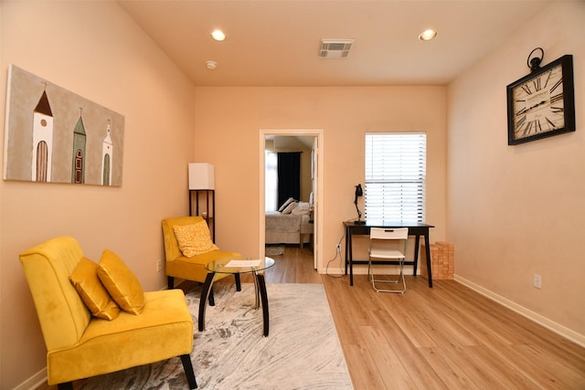 sitting room featuring light wood-type flooring