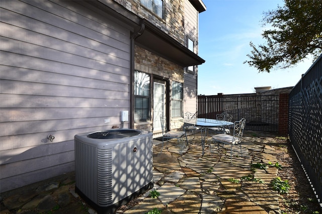 view of patio / terrace featuring cooling unit