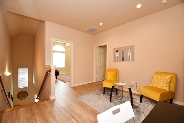 sitting room with light hardwood / wood-style flooring