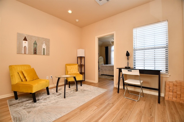 living area featuring light hardwood / wood-style floors