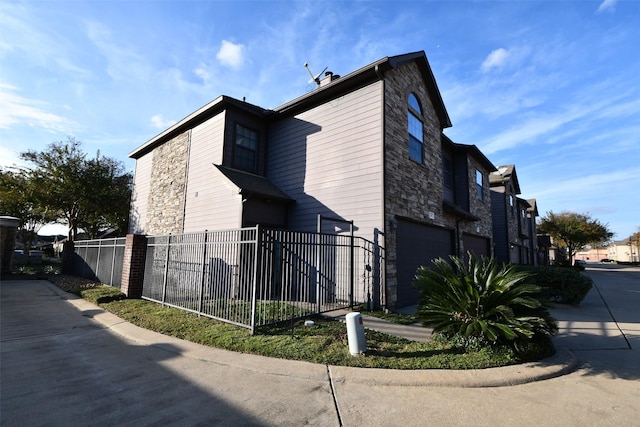 view of home's exterior featuring a garage