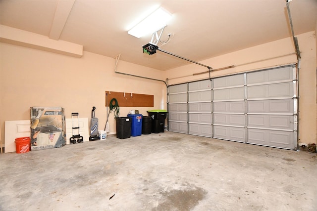 garage featuring a garage door opener