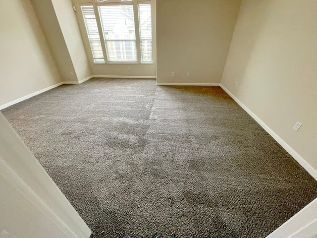 spare room featuring carpet flooring